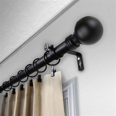 The Exclusive Home Prism decorative curtain rod and finial set features gleaming, crystal-look square finials and metal look end caps on a durable, sturdy iron rod and offers an elegant combination of classic and modern design details. . Curtain rods lowes